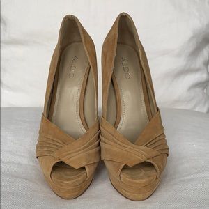 Nude textile open toe heal.